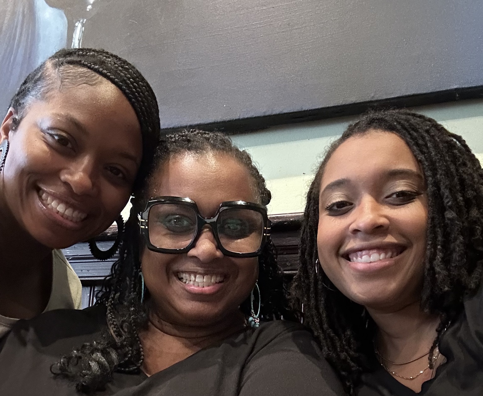 Three Limitless EmpowHERment Foundation board members smiling together