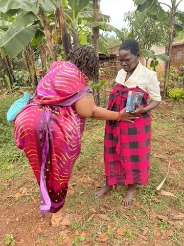 A woman sharing support during a global outreach moment